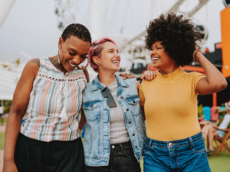 group of three laughing together